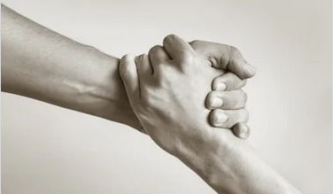two hands holding hands to show the support of a membership
